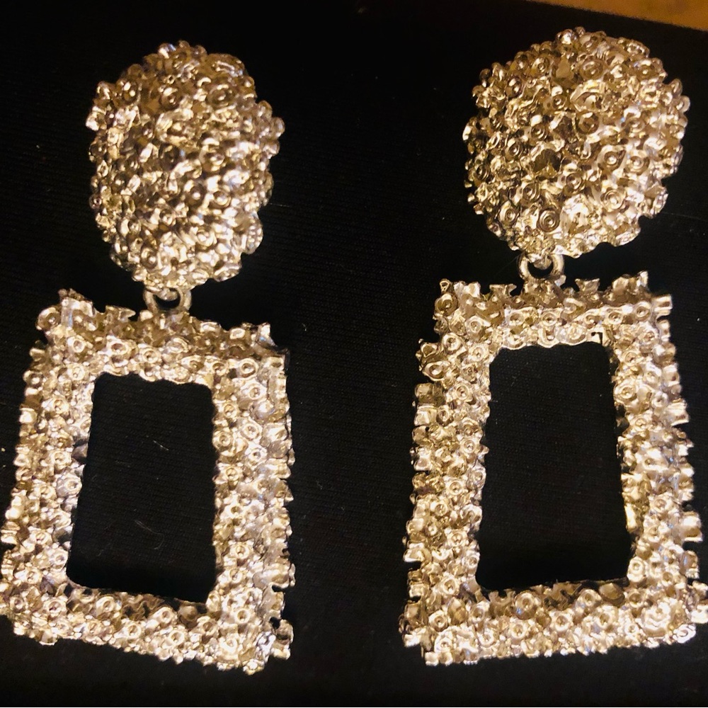 Silver toned earrings